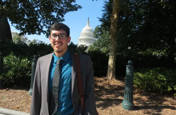 Andres Mata, a member of the Volunteer Advocacy Coordinators Network (VACN) stands outside of the Capitol building in Washington DC in between “Hill visits”, constituent meetings with congressional representatives and their staff on Capitol Hill.